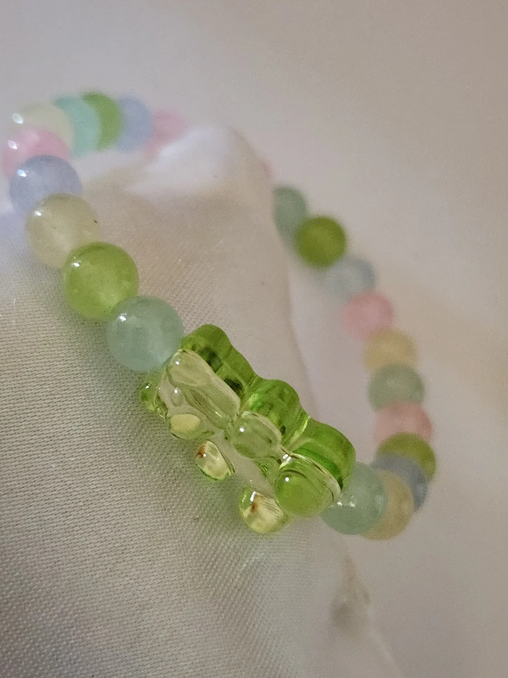 Hand Crafted Pastel Beaded Stretch Bracelet with Green Bear Charm